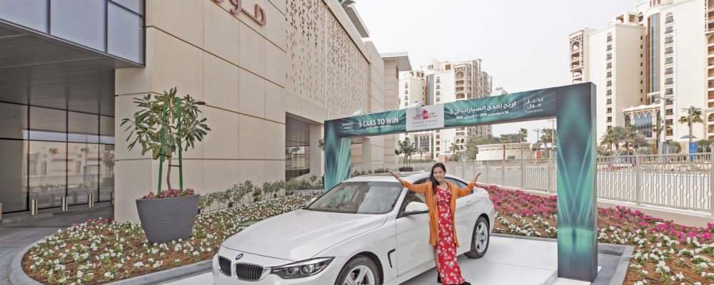 Filipina Mum Of Three Bags Brand New BMW In Nakheel Mall’s DSF Promotion